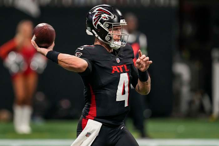 Dec 24, 2023; Atlanta, Georgia, USA; Atlanta Falcons quarterback Taylor Heinicke (4) passes against the Indianapolis Colts at Mercedes-Benz Stadium.